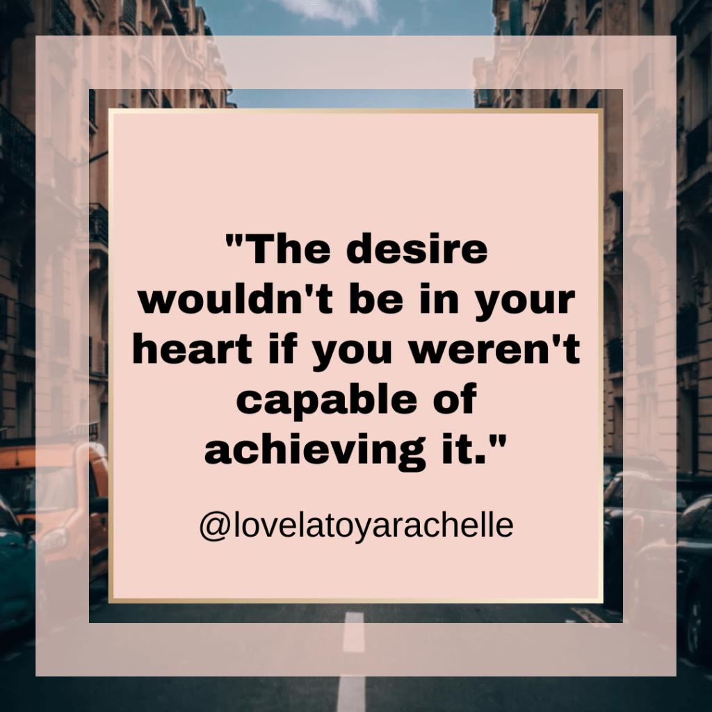 The image features a framed quote against a blurred city street backdrop. The quote reads: "The desire wouldn't be in your heart if you weren't capable of achieving it," attributed to @lovelatorachelle. The central theme aligns with overcoming imposter syndrome, motivational and inspirational messages, emphasizing self-belief, and the potential for achievement.